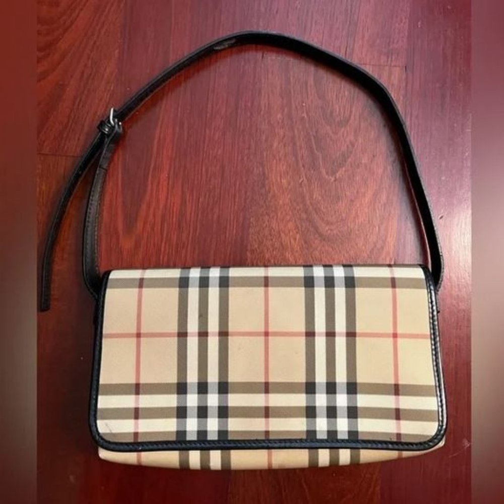 Burberry clutch/shoulder bag.